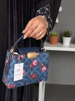 شنط كوتش مرسومه بالكرز