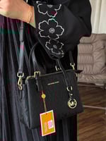 شنطه شانيل اسود لوقو فضي