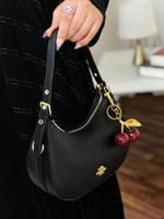 شنطه كوتش مع الميداليه