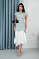 فستان سهرة أنيق بتصميم غير متماثل ولمسات فاخرة ممي...