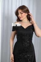 فستان سهرة سمفونية الليل الأسود بتطريز فاخر وأكتاف...