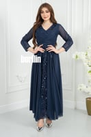 فستان سهرة بأكمام شفافة وتطريز ترتر فاخر لون كحلي