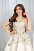 فستان سهرة العاج الملكي بتطريز ذهبي ولمعان ميكادو...