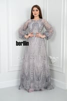 فستان سهرة بتصميم ملكي أنيق مزين بالتطريز اللامع و...