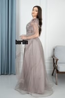 فستان سهرة جالكسي بتصميم ملكي مزين بالتطريز البراق...