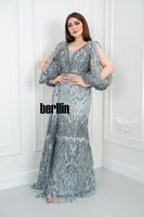 فستان سهرة أنيق بتصميم يتميز بتطريز فاخر مع أكمام...