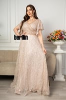 فستان سهرة طويل مطرز مزين بالفصوص لون ذهبي