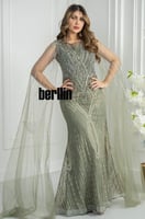 فستان سهرة اخضر فخم مطرز بالكامل مع كاب تول شفاف ب...