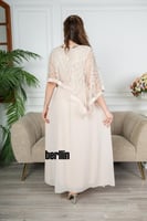 فستان سهرة طويل بحافة واسعة واكمام كيب لون بيج