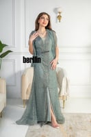 فستان سهرة ماكسي مطرز بأكمام شفافة لون تيفاني