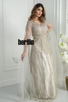 فستان سهرة ذهبي مطرز بالكامل مع كاب تول شفاف يمنح...