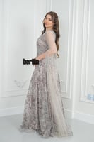 فستان سهرة نمط مرميد فخم مميز بتطريز وبأكمام كيب ت...