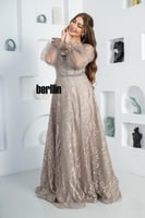 فستان سهرة ماكسي مميز بكم بف وبقصة واسعة لون بيج