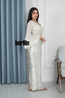 فستان سهرة ترتر بأكمام طويلة واسعة لون ابيض