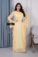 فستان ماكسي بتفاصيل كشكش وبكم حبال كلوش لون اصفر