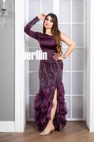 فستان سهرة طويل سواريه ماسك على الجسم بأكمام طويله...