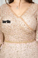 فستان سهرة طويل مطرز مزين بالفصوص لون ذهبي