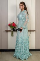 فستان سهرة ملكي بلون اخضر نعناعي بتطريز فاخر وورود...