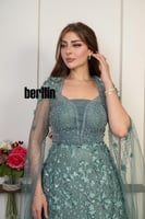 فستان سهرة ملكي بلون اخضر نعناعي بتطريز فاخر وورود...