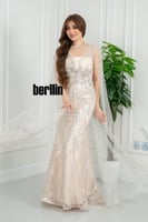 فستان سهره شامبانيا مائي بقصّة حورية تطريز ريش لام...