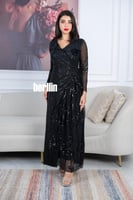 فستان أسود ترتر طويل بتطريز ترتر لامع ولمسات شفافة...