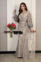 فستان سهرة شامبين مطرّز بتفاصيل فاخرة وأكمام شفافة...