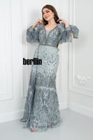 فستان سهرة أنيق بتصميم يتميز بتطريز فاخر مع أكمام...