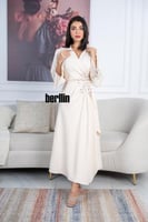 فستان بيج أنيق بقصة ملفوفة وتطريزات لؤلؤية فاخرة