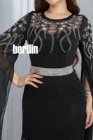 فستان سهرة اسود بترتر فضي وأكمام فراشة