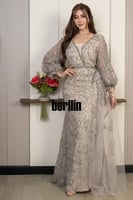 فستان سهرة شامبين مطرّز بتفاصيل فاخرة وأكمام شفافة...