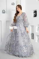 فستان سهرة نمط مرميد مميز بكم بف وبقصة واسعة