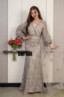 فستان سهرة شامبين مطرّز بتفاصيل فاخرة وأكمام شفافة...