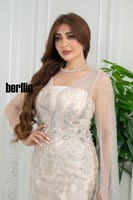 فستان سهره شامبانيا مائي بقصّة حورية تطريز ريش لام...