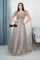 فستان سهرة جالكسي بتصميم ملكي مزين بالتطريز البراق...