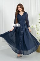 فستان سهرة بأكمام شفافة وتطريز ترتر فاخر لون كحلي