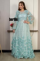 فستان سهرة ملكي بلون اخضر نعناعي بتطريز فاخر وورود...