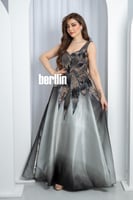 فستان سهرة الأومبري الفضي بتطريز نجمي ولمعة معدنية...