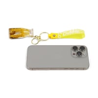 تعليقة شنط بشكل قارورة باللون الأصفر