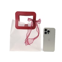 أكياس هدايا كبيرة فاخرة وشفافة بشريطة علوية لون أح...