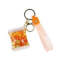 تعليقة شنط شكل كيس باللون البرتقالي