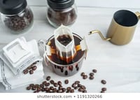 مجموعة (25) فلتر للقهوة المقطرة والشأي مع مثبت للك...