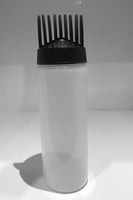 علبة بلاستيكية مع مشط لتوزيع الزيت والخلطات للشعر...