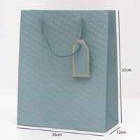 أكياس هدايا منقطة بألوان متعددة