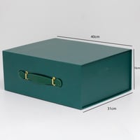 علب هدايا بمقبض جلدي