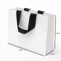 أكياس هدايا ورقية بمقبض شريطة عريض