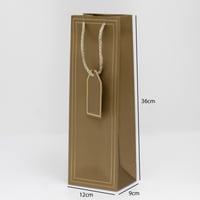 كيس هدايا طويل بإطار ذهبي