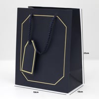 أكياس هدايا بإطار ذهبي