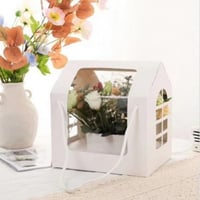 علب هدايا ورقية بشكل منزل