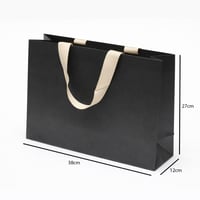 أكياس هدايا ورقية بمقبض شريطة عريض