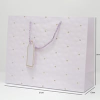 أكياس هدايا مزخرفة بتصميم ورد